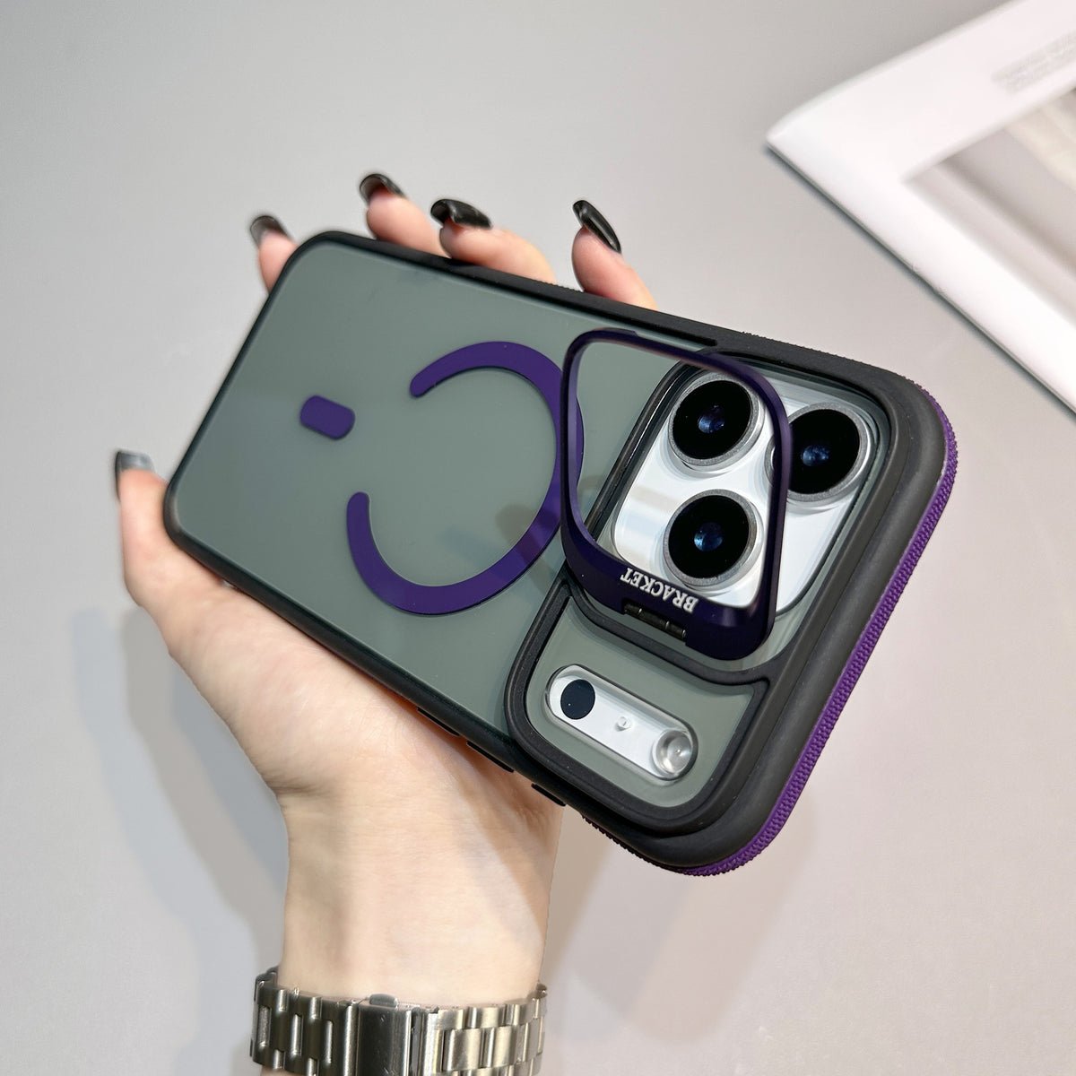 Purple magnetic iPhone case with copper lens frame